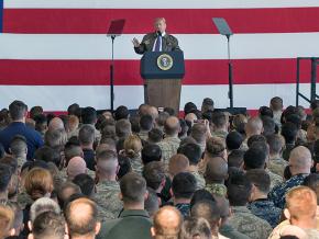 Donald Trump delivers an address at the Yokota Air Base in Japan